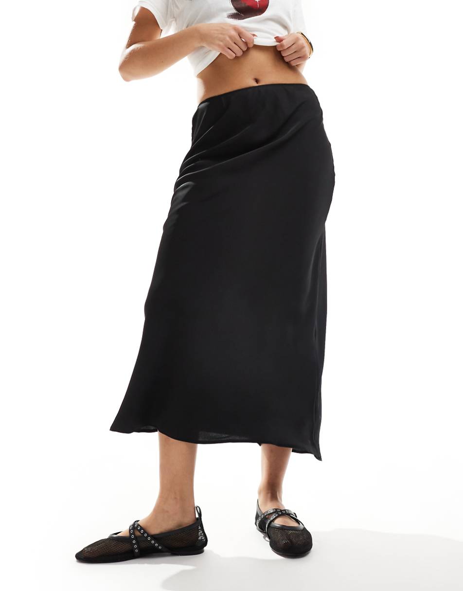 ASOS DESIGN satin bias midi skirt in black