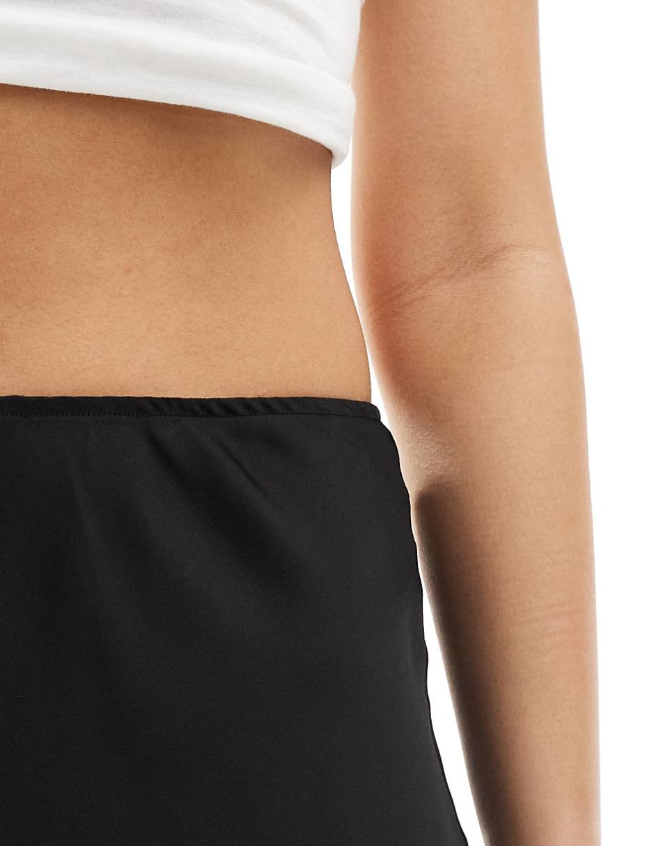 ASOS DESIGN satin bias midi skirt in black
