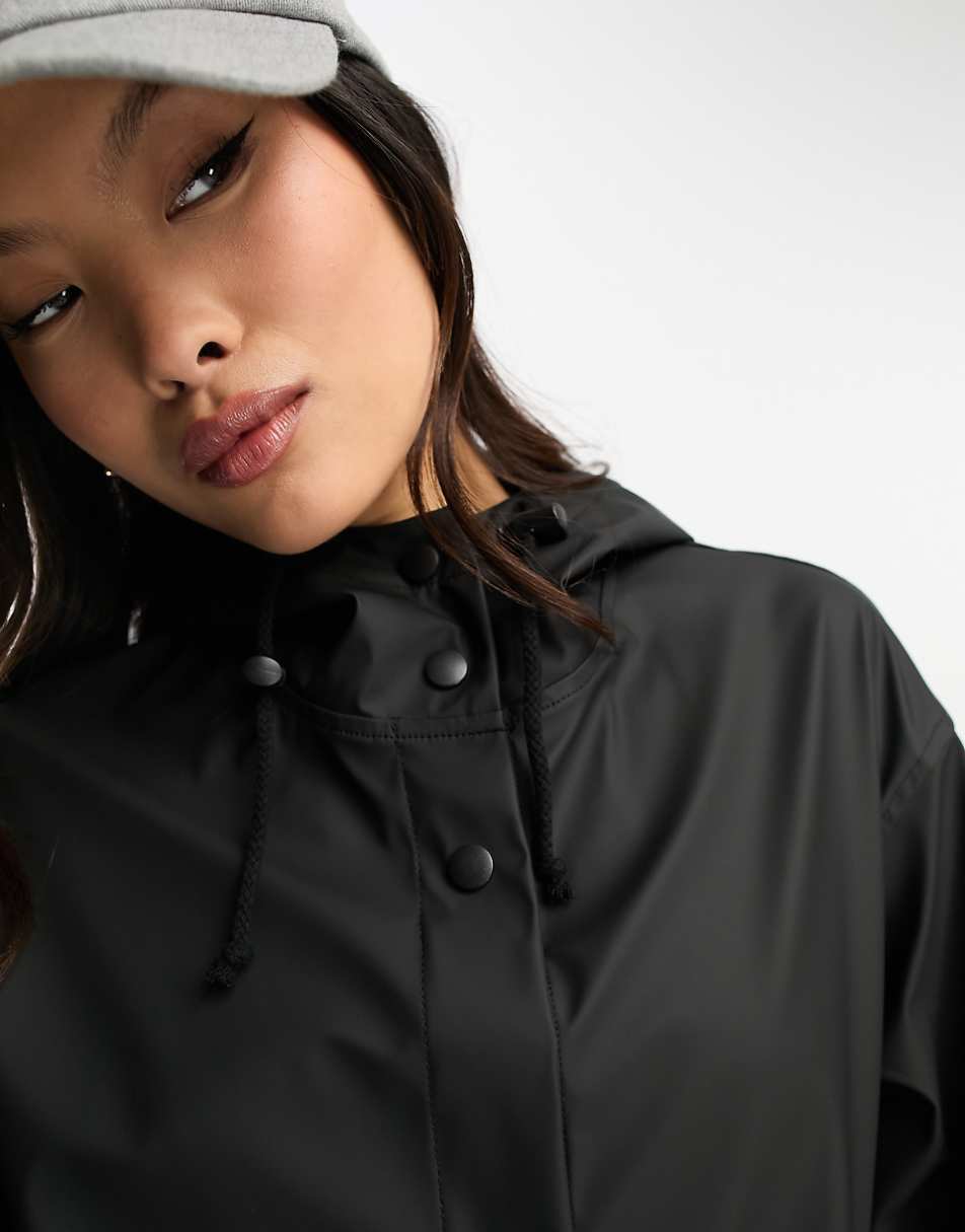ASOS DESIGN Petite rubberized rain parka coat in black