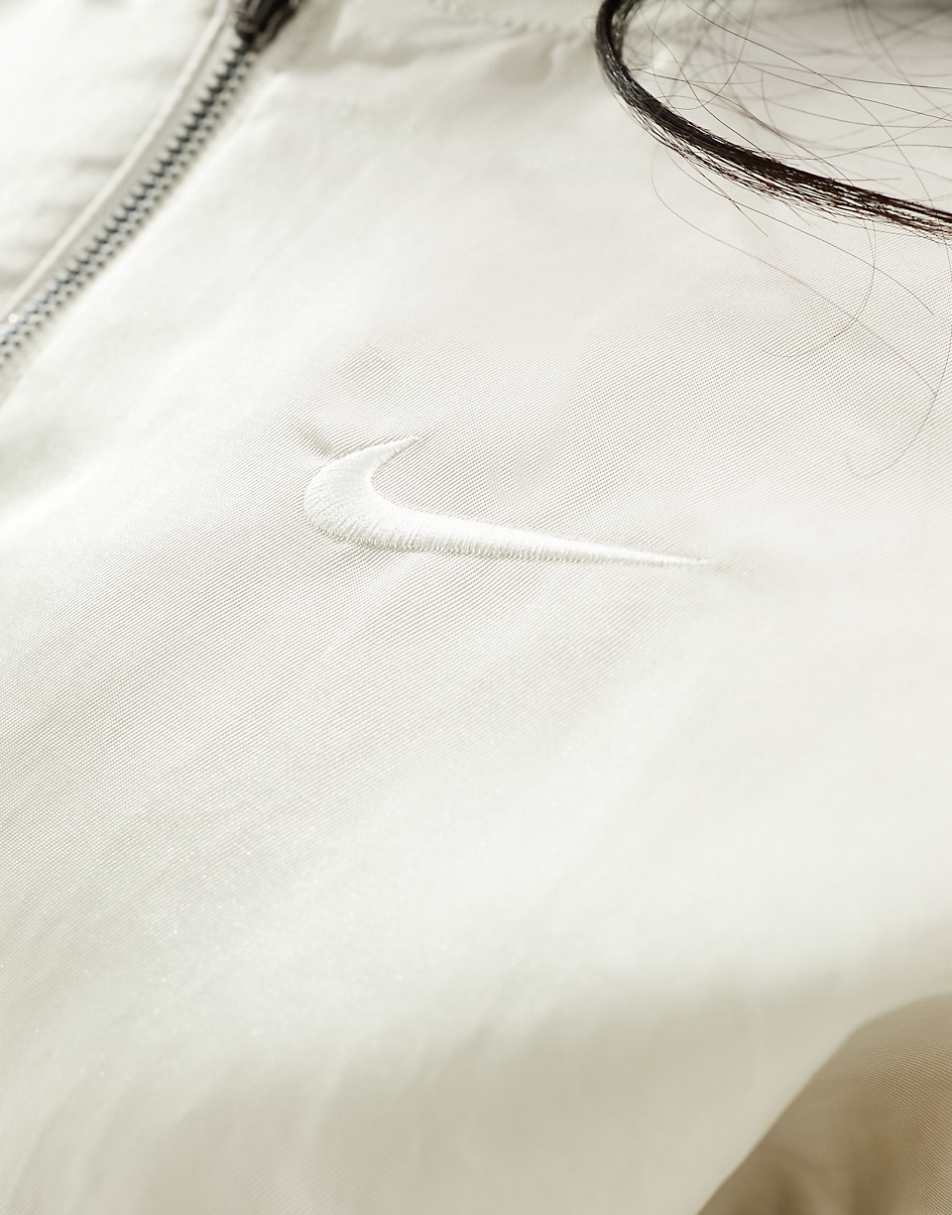 Nike mini swoosh varsity bomber jacket in light orewood brown