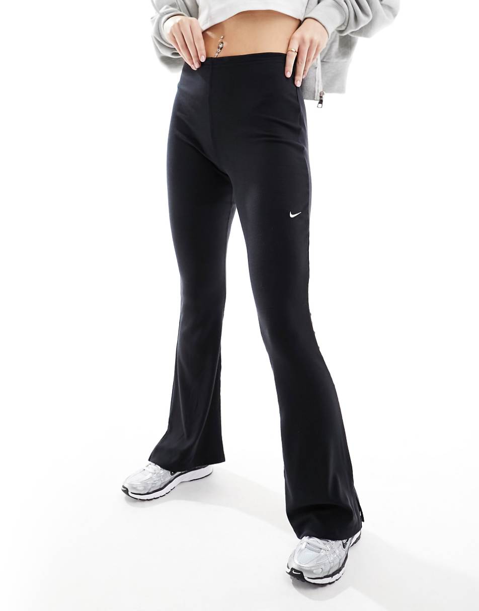 Nike ribbed mid rise flared pants in black