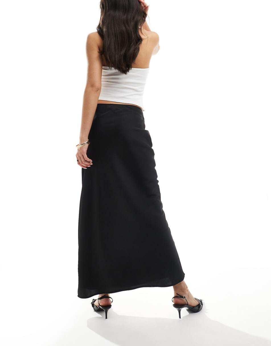 ASOS DESIGN satin bias maxi skirt in black