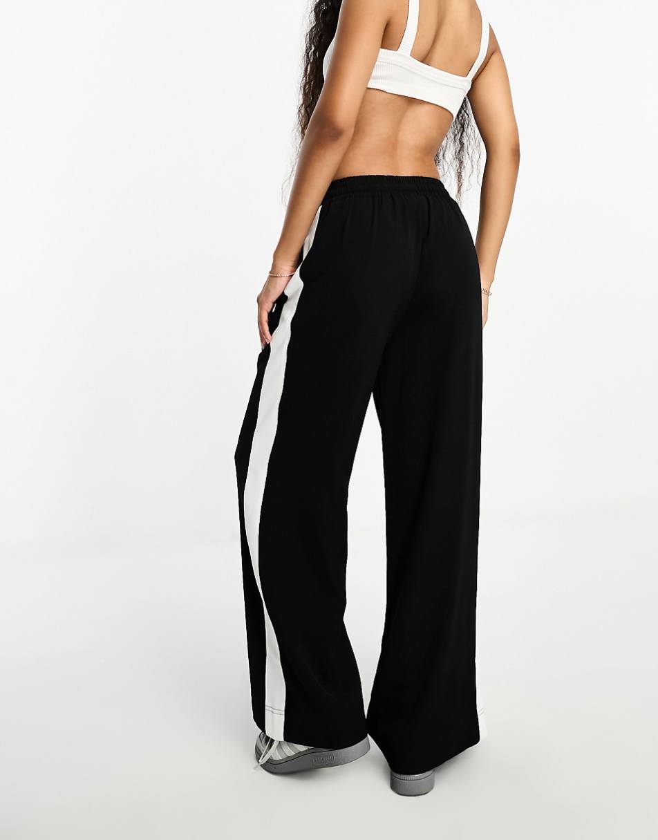 ASOS DESIGN Petite pull on pants with contrast panel in black