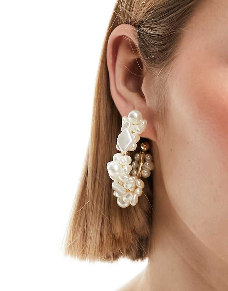 ASOS DESIGN 50mm hoop earrings with faux natural pearl design in gold tone