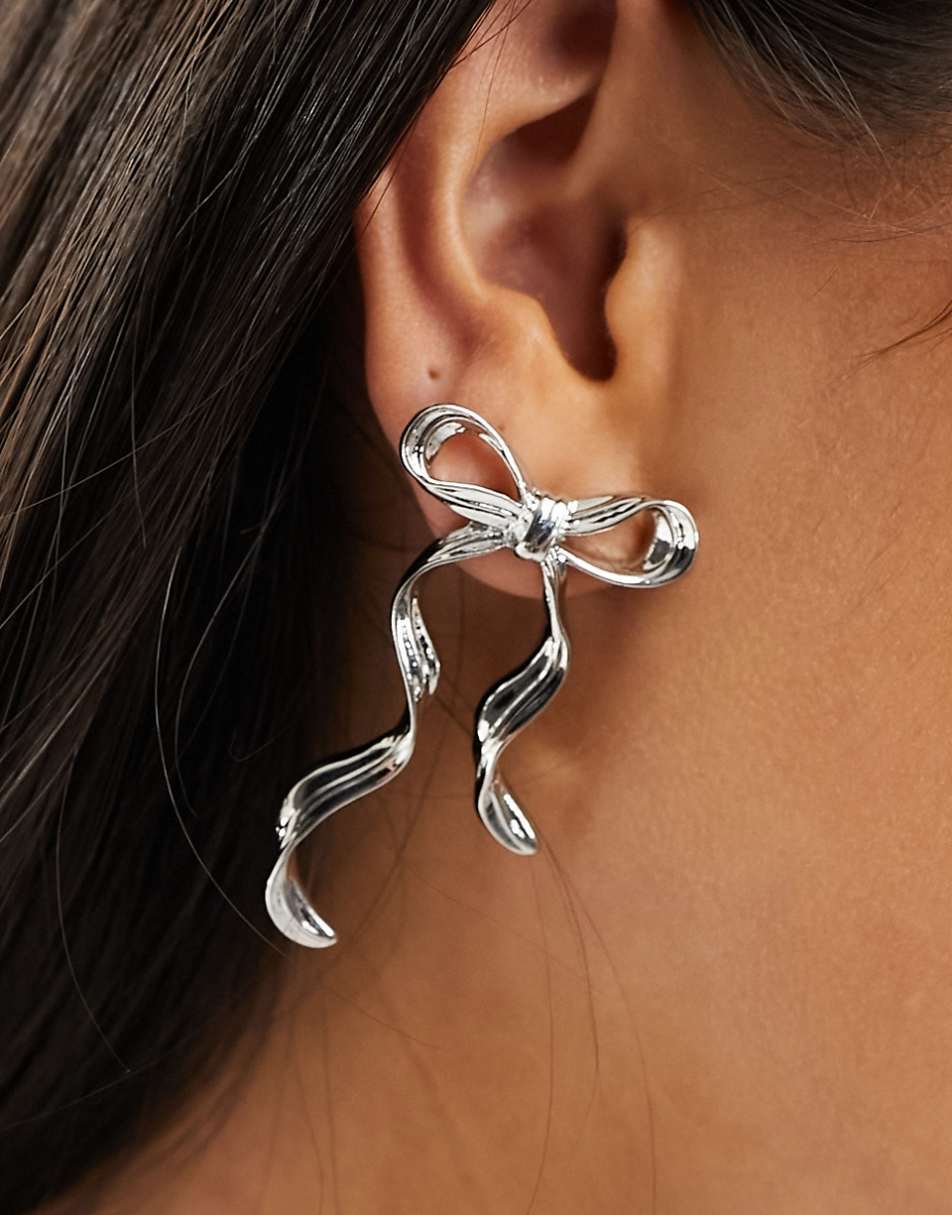 ASOS DESIGN stud earrings with bow design silver tone