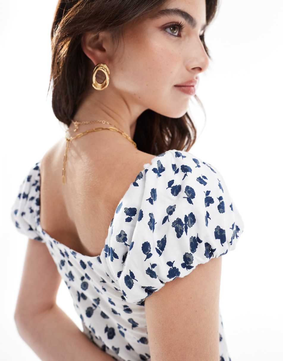 ASOS DESIGN square neck mini dress with puff sleeve and button front in white floral print