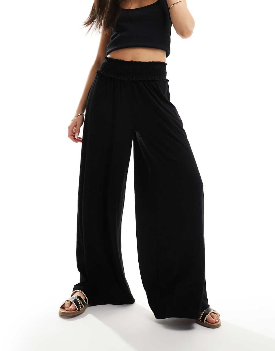 ASOS DESIGN shirred waist wide leg pants in black