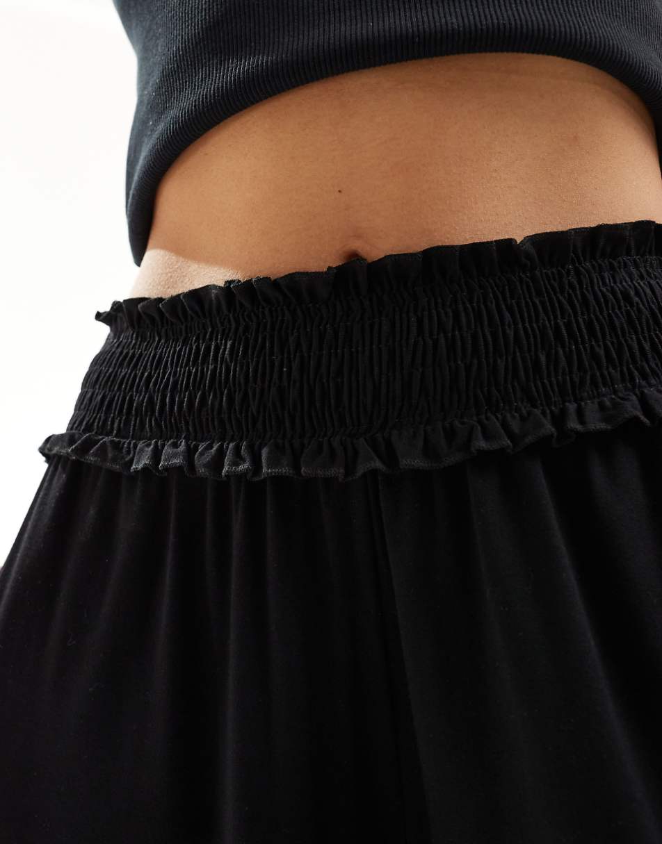 ASOS DESIGN shirred waist wide leg pants in black