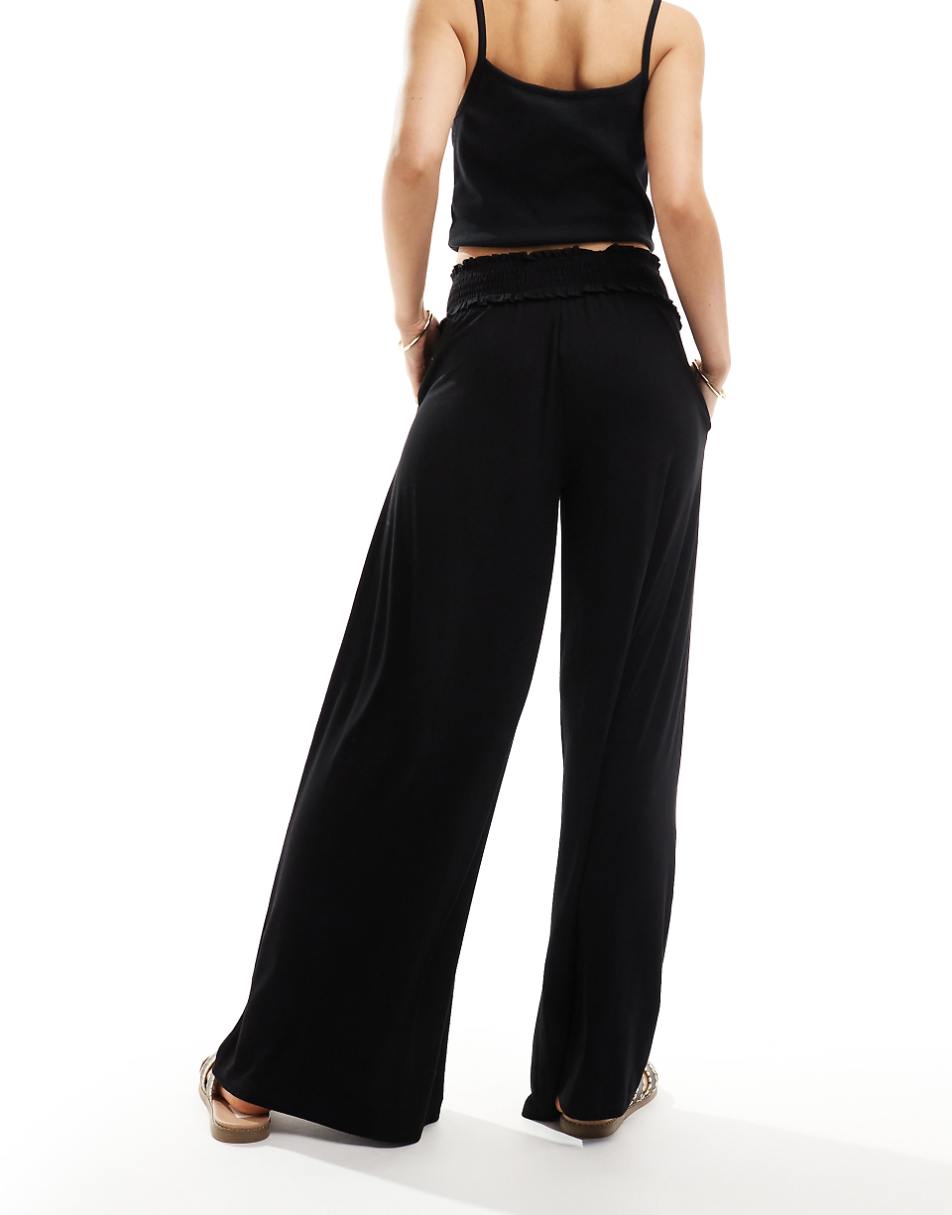 ASOS DESIGN shirred waist wide leg pants in black