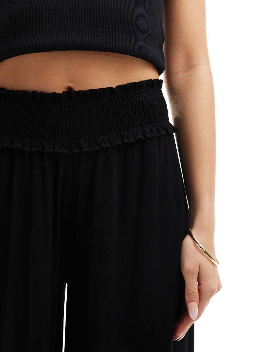 ASOS DESIGN shirred waist wide leg pants in black