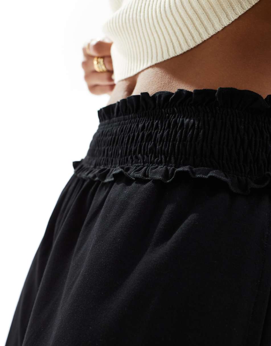 ASOS DESIGN Petite shirred waist cropped culotte pants in black