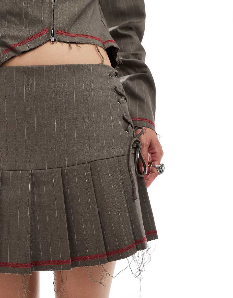COLLUSION pleated mini skirt with lace up detail and raw hem - part of a set