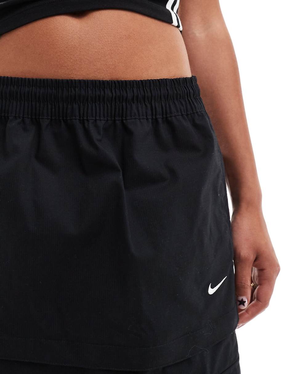 Nike Woven 2 n 1 maxi and mini skirt with zip detail in black