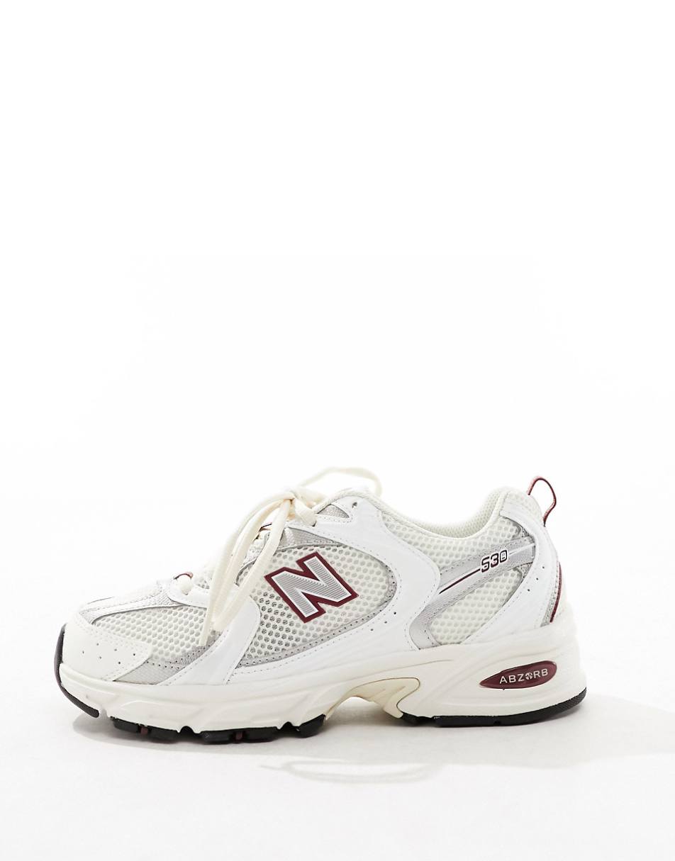 New Balance 530 sneakers in white with red and gray details