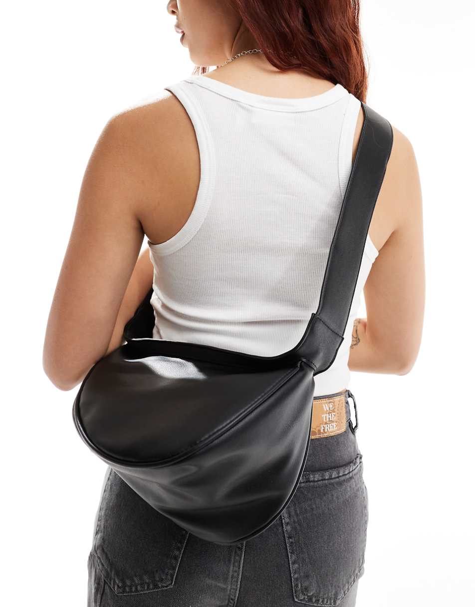 Glamorous asymmetric crossbody bag in black leather look