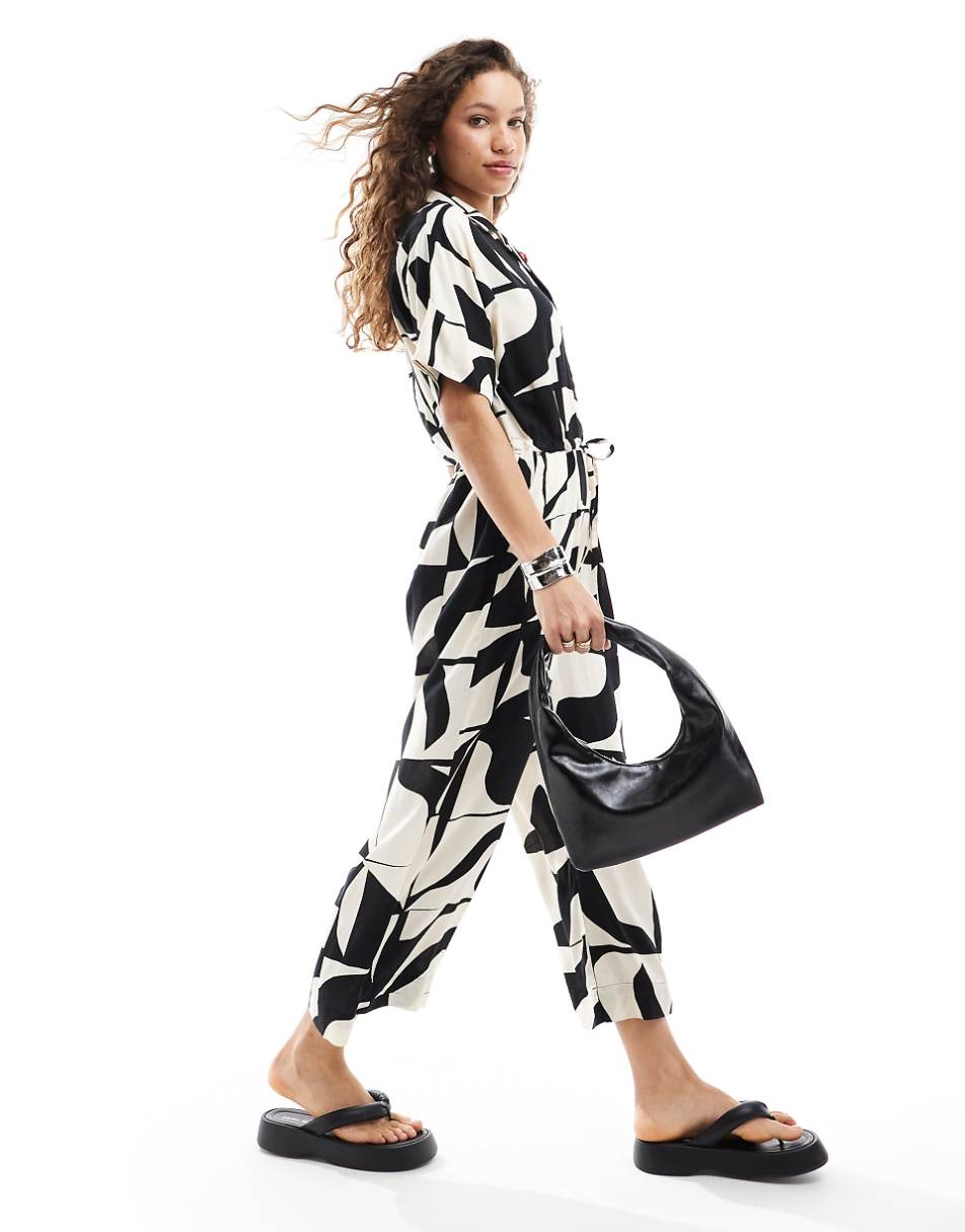 Monki tie waist jumpsuit in black and white puzzle print