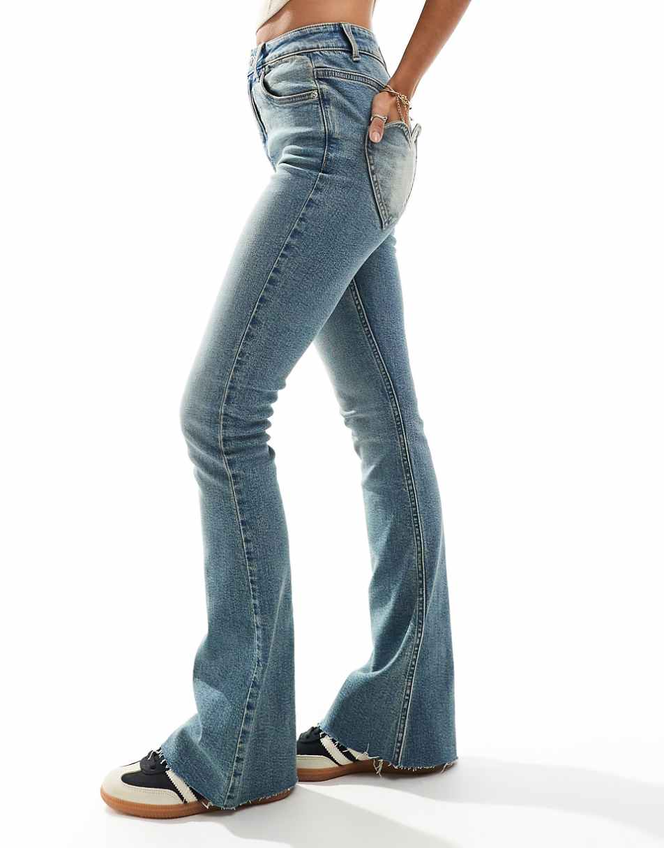 Miss Selfridge heart pocket flare jeans in dirty wash