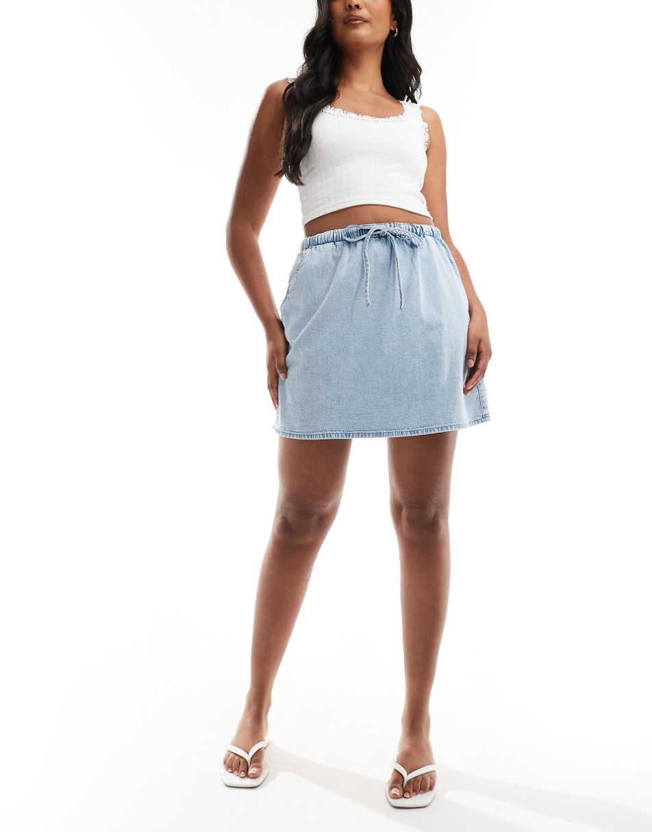 ASOS DESIGN soft denim pull on mini skirt in light wash
