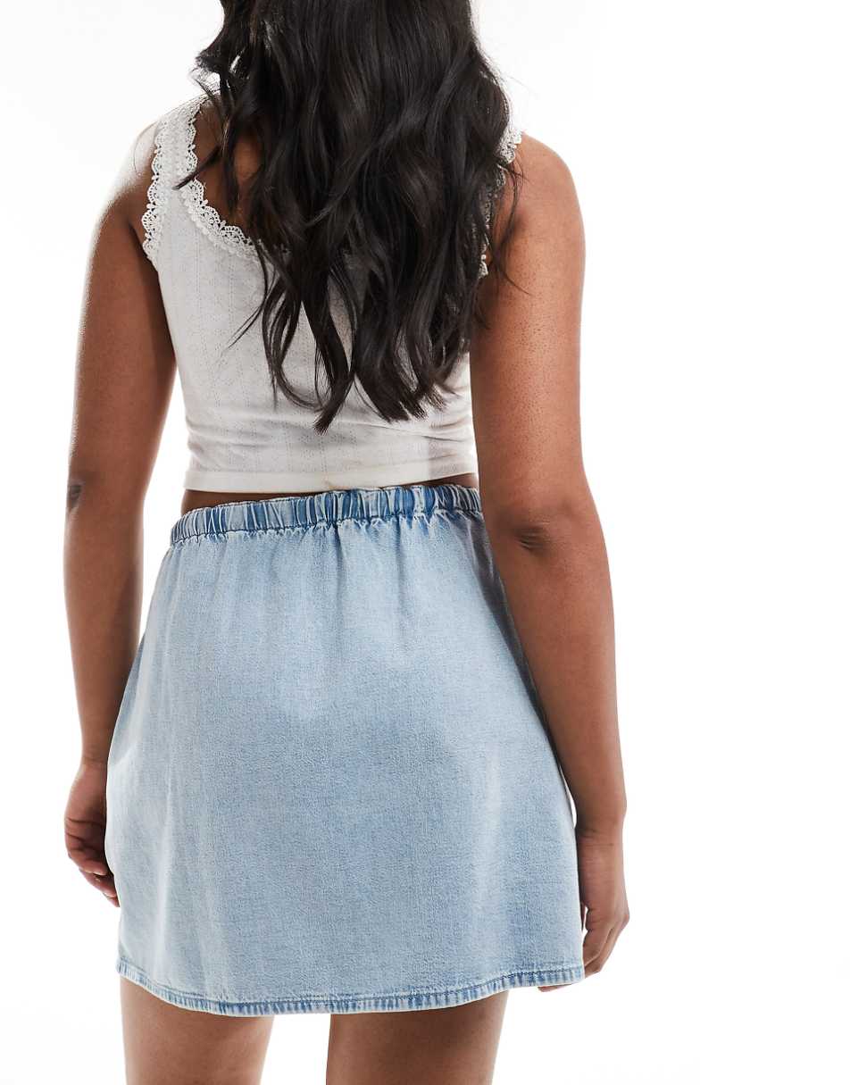 ASOS DESIGN soft denim pull on mini skirt in light wash