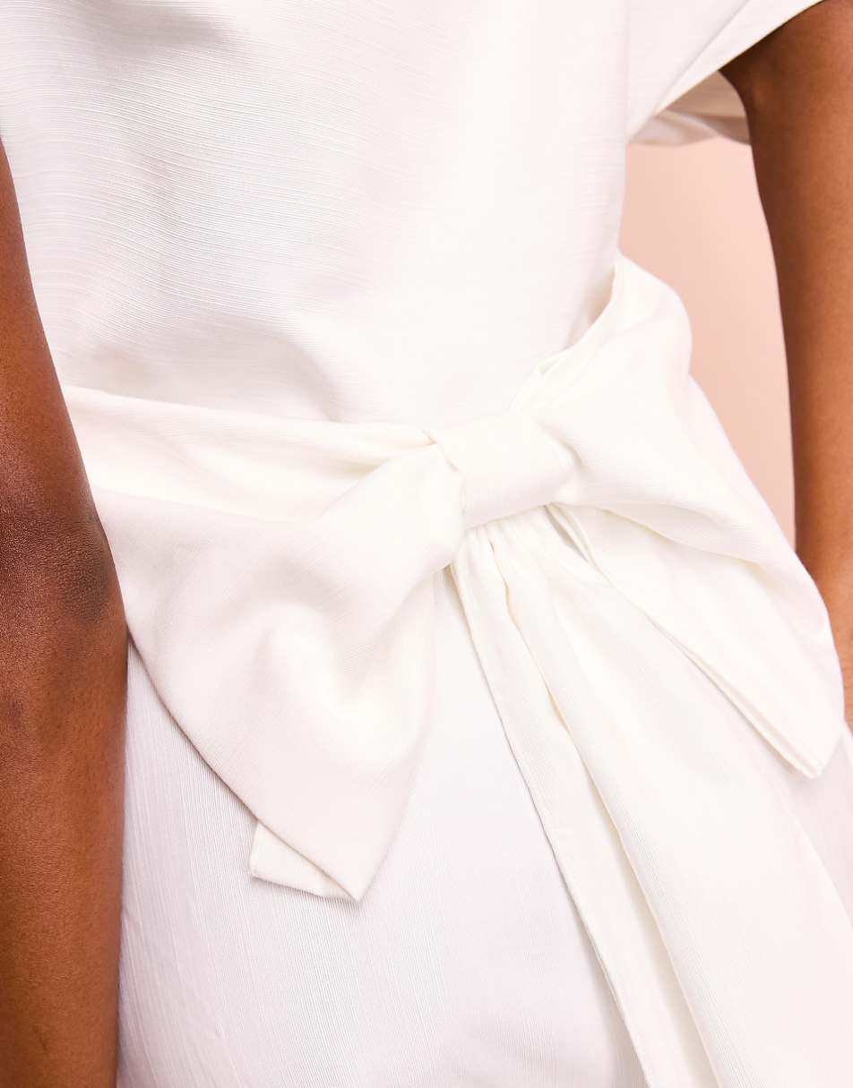 ASOS Luxe drop shoulder jumpsuit with bow back in cream