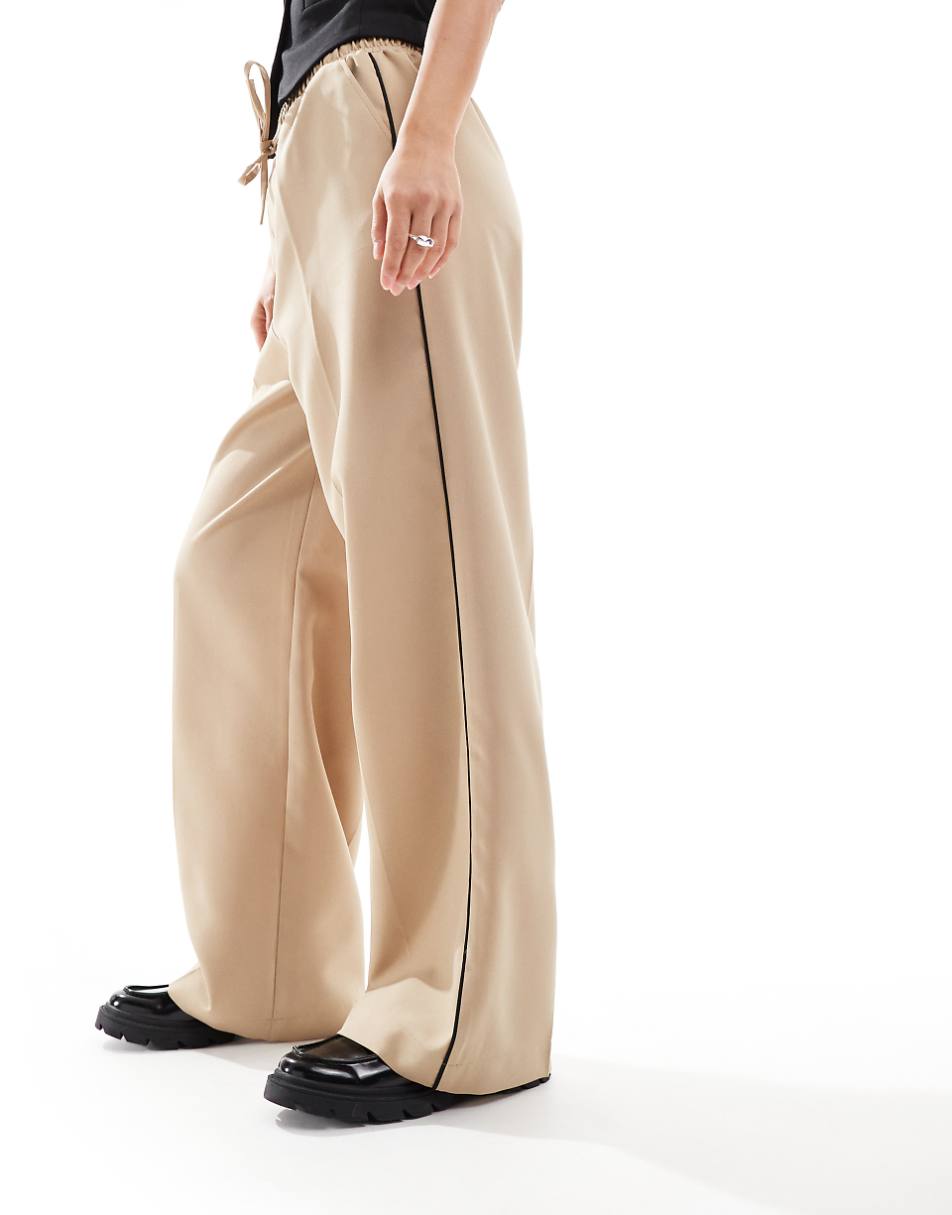 ASOS DESIGN tailored pull on pants with piping in sand