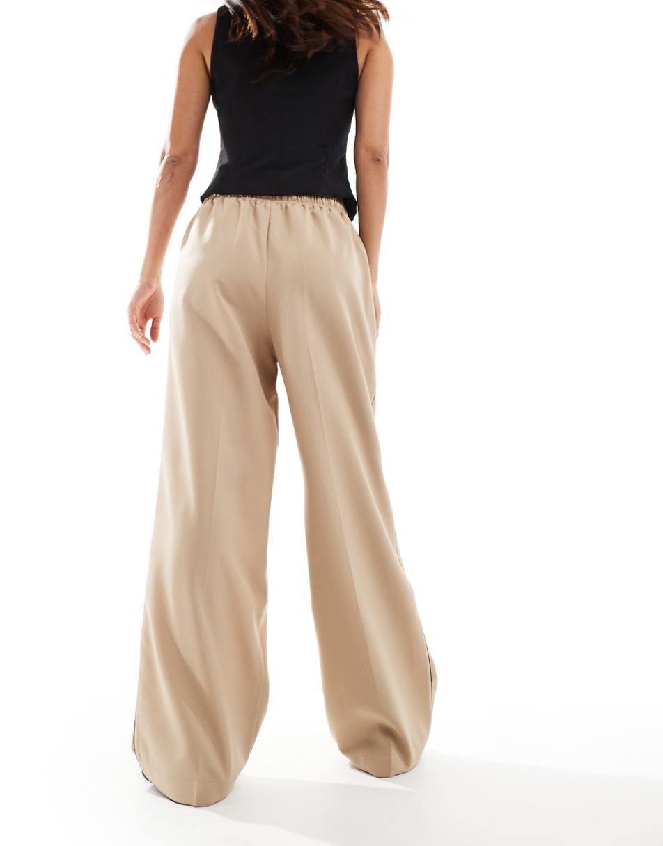 ASOS DESIGN tailored pull on pants with piping in sand