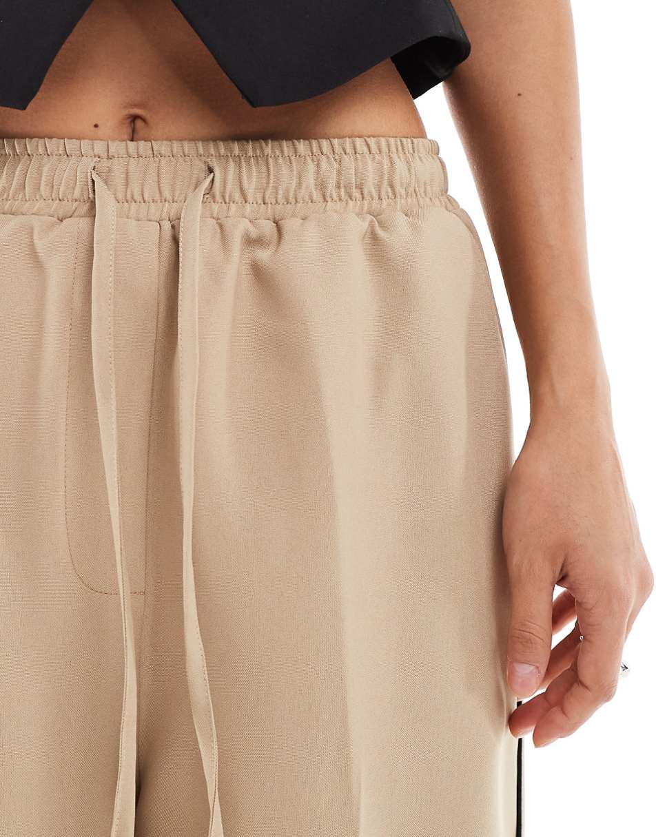 ASOS DESIGN tailored pull on pants with piping in sand