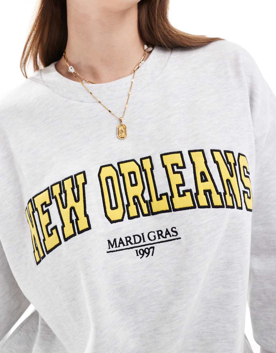 ASOS DESIGN oversized sweat with new orleans graphic in ice heather