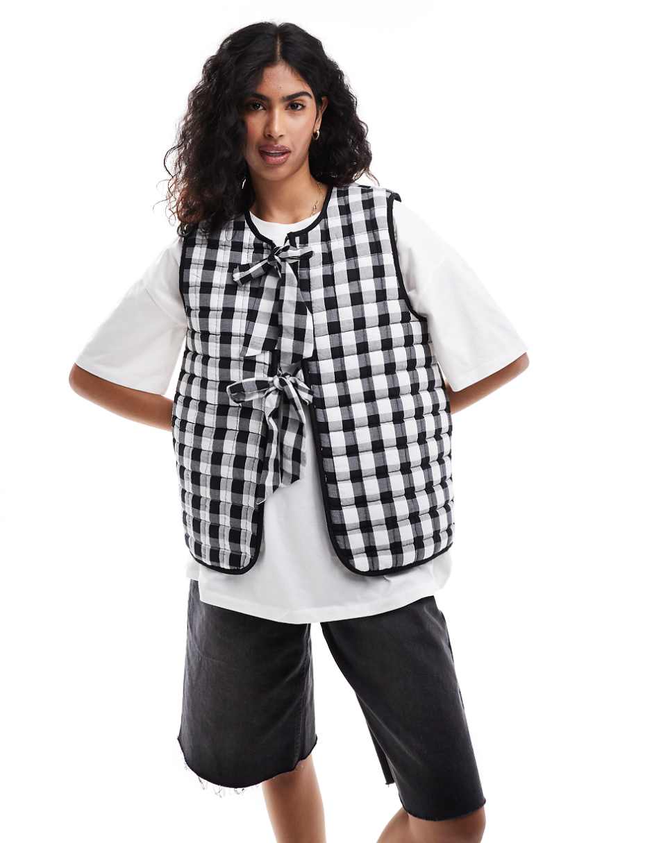 ASOS DESIGN quilted vest with bows in mono gingham