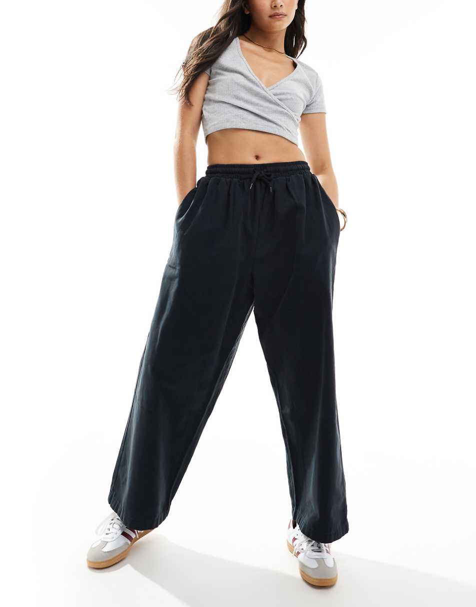 ASOS DESIGN oversized barrel leg pull on pants in black