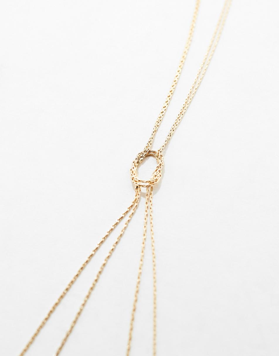 ASOS DESIGN lariat necklace with fine snake knot design in gold tone