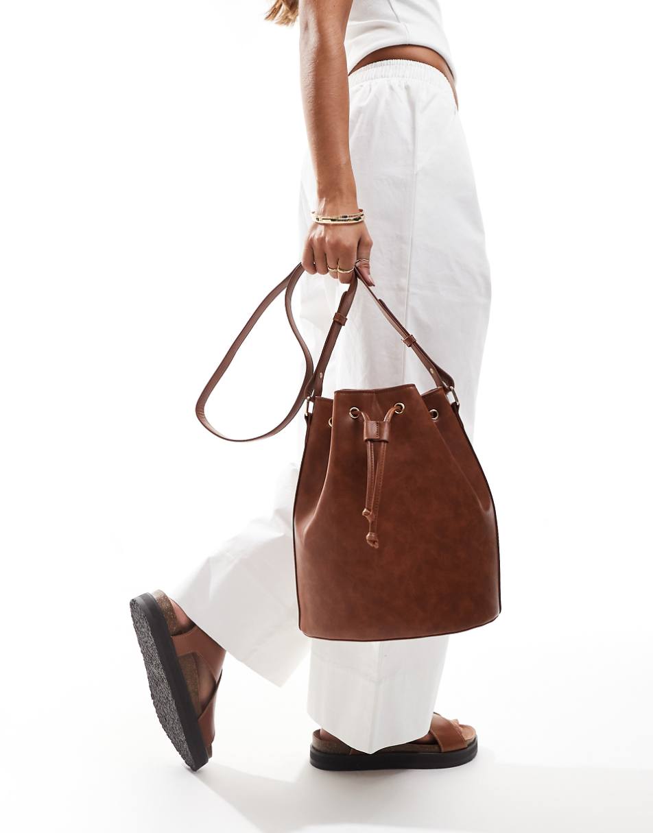 Glamorous crossbody bucket bag in brown