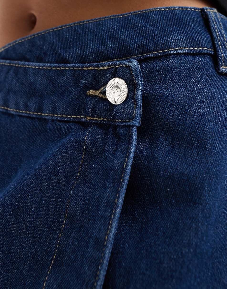 JDY high waist asymmetric denim skirt in mid blue