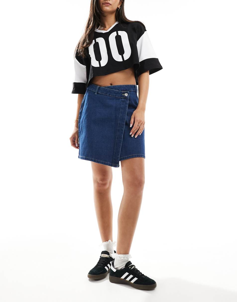 JDY high waist asymmetric denim skirt in mid blue