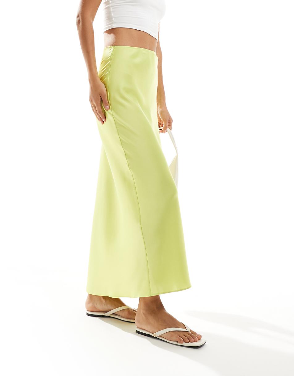 ASOS DESIGN satin bias midi skirt in lemon