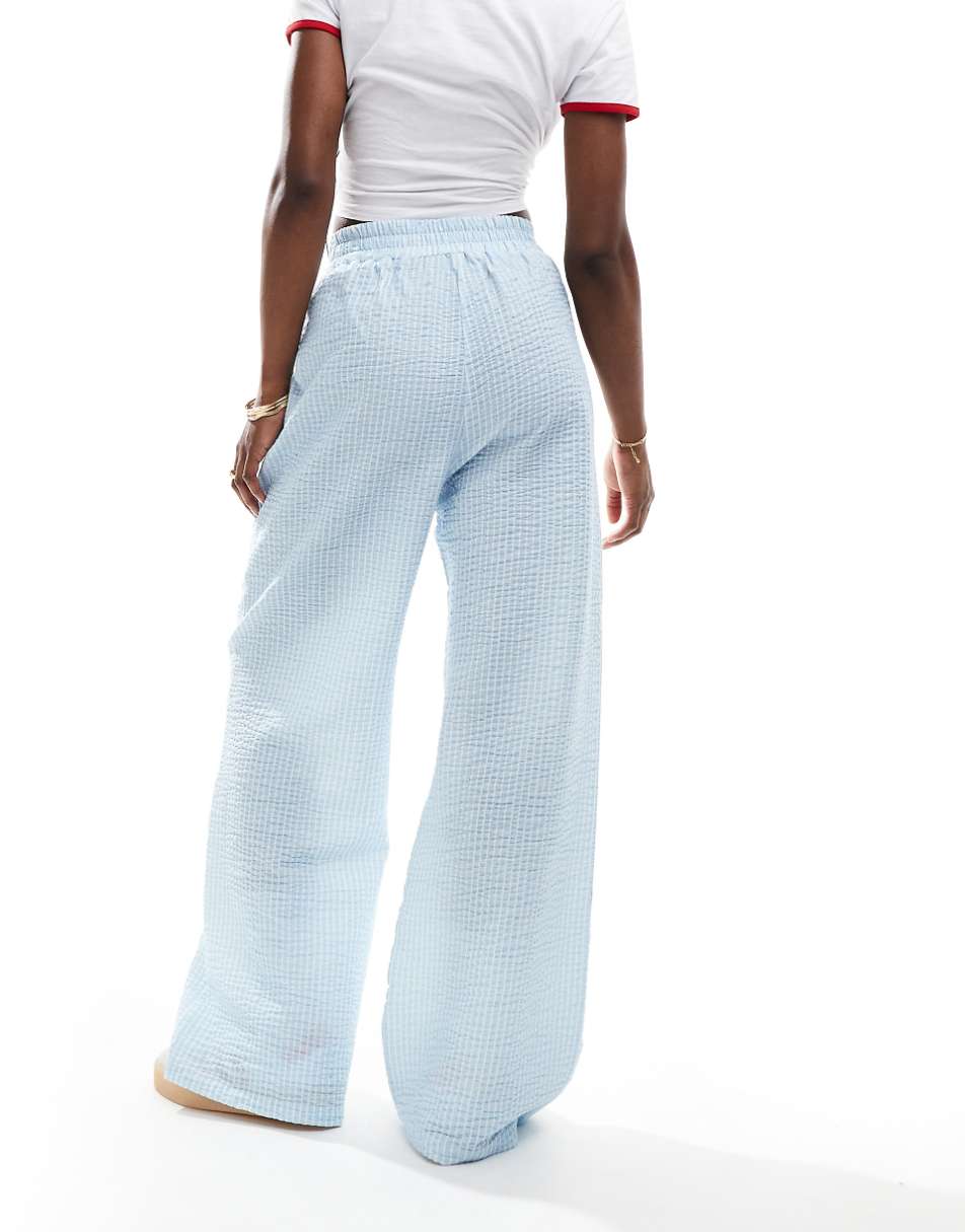 ASOS DESIGN seersucker tie waist wide leg pants in blue & white stripe