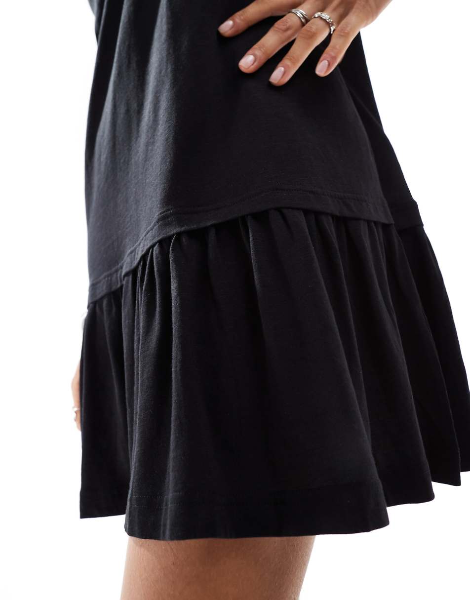 Monki sleeveless jersey mini dress with drop waist in black