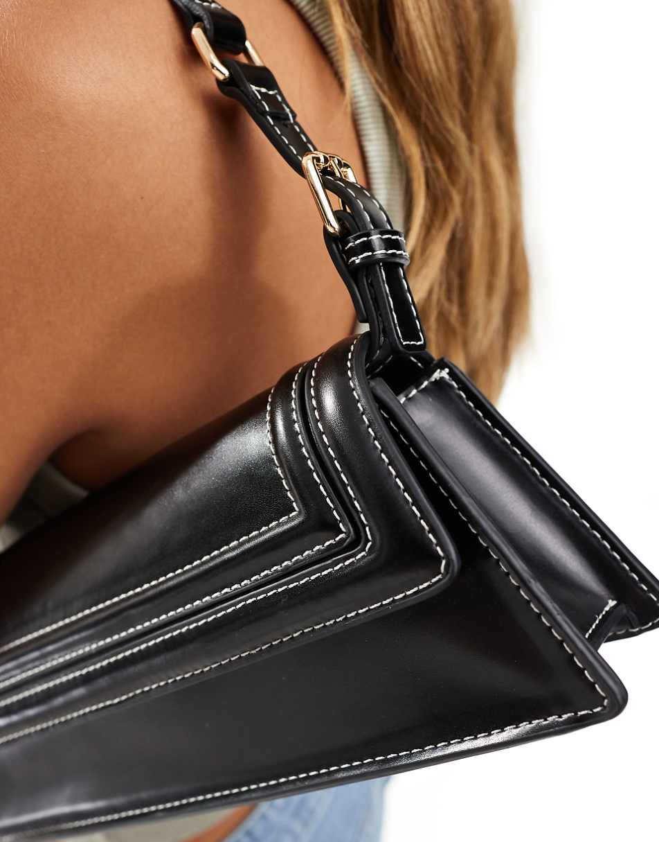 ASOS DESIGN structured elongated shoulder bag with contrast stitch in black