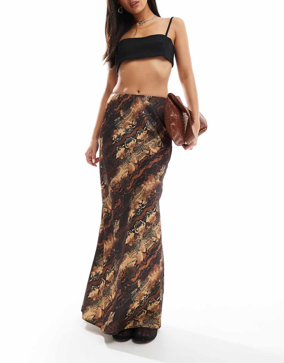 ASOS DESIGN satin bias cut midi skirt in animal print