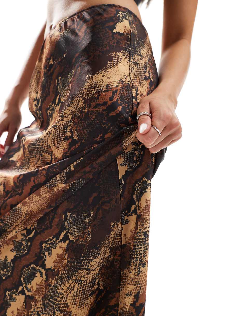 ASOS DESIGN satin bias cut midi skirt in animal print
