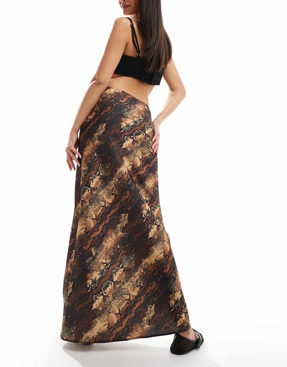 ASOS DESIGN satin bias cut midi skirt in animal print