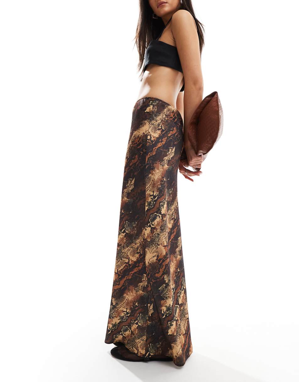 ASOS DESIGN satin bias cut midi skirt in animal print