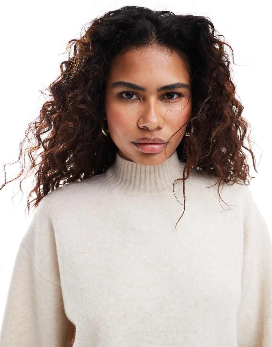 Monki knitted turtleneck sweater in beige melange