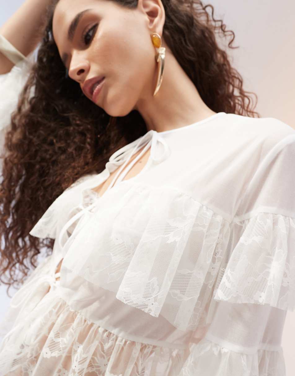 ASOS DESIGN tie front layered ruffle blouse with lace inserts in ivory