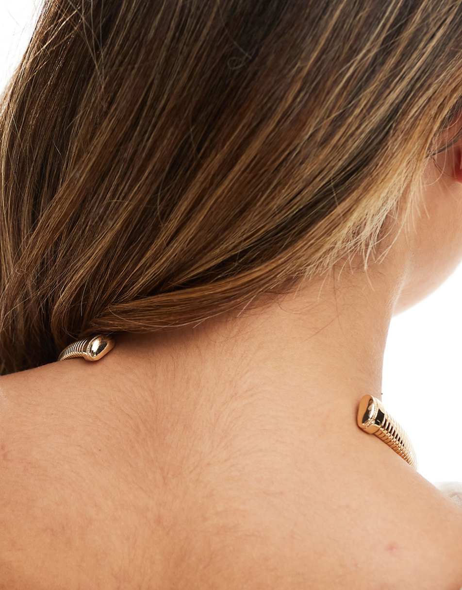 ASOS DESIGN torque choker with ribbed design in gold tone