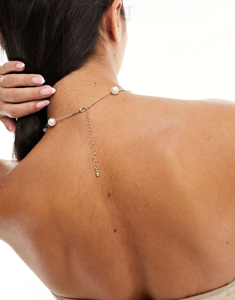 ASOS DESIGN short necklace with mixed sized faux pearl in gold tone