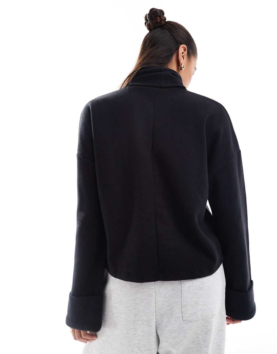 ASOS DESIGN super soft roll neck sweater with cuff detail in black