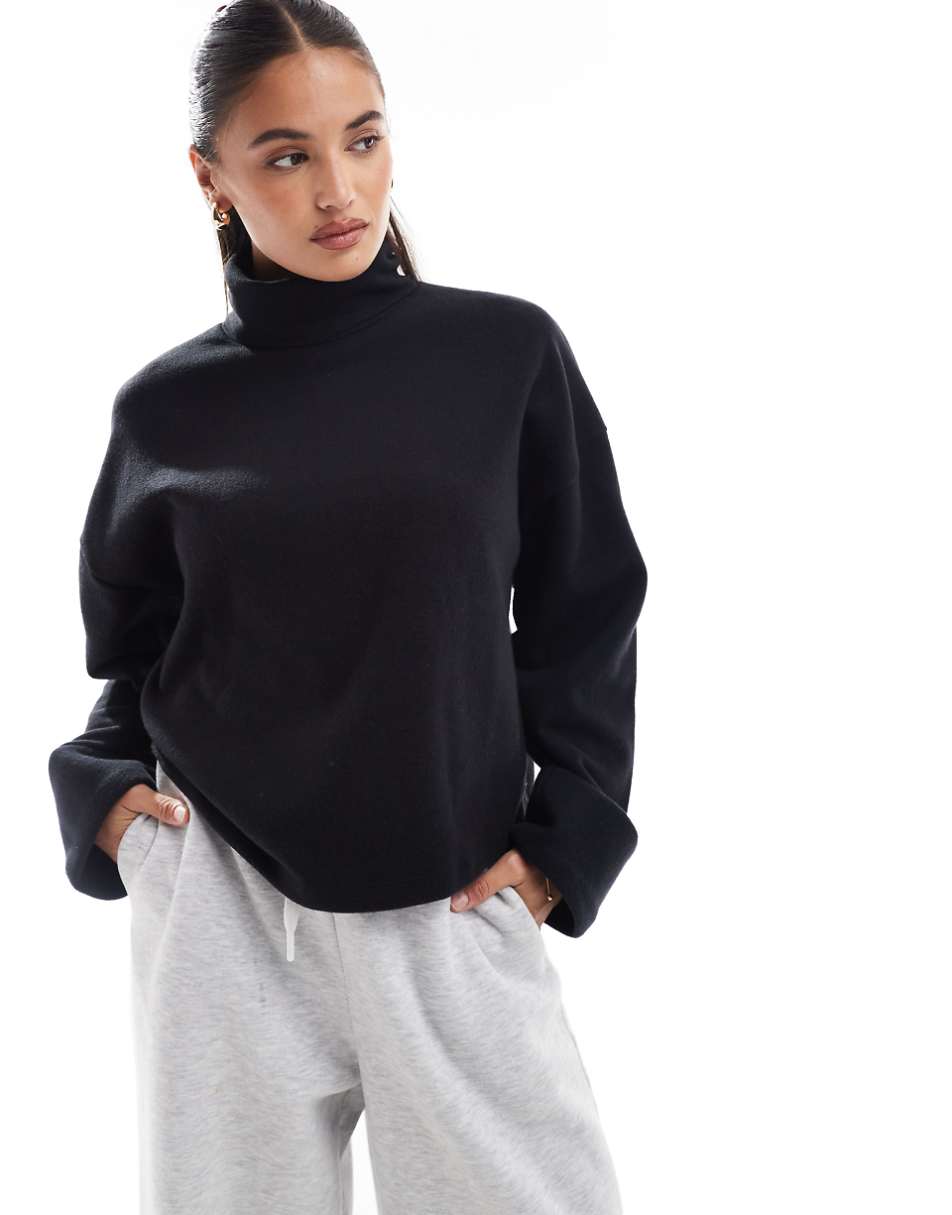 ASOS DESIGN super soft roll neck sweater with cuff detail in black