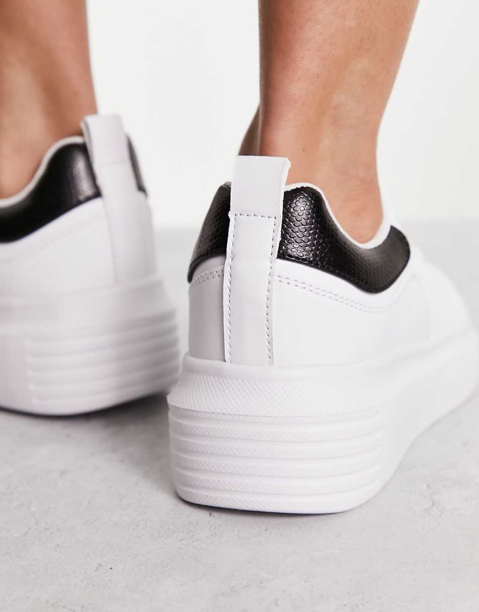 Truffle Collection chunky sneakers in white with black back tab