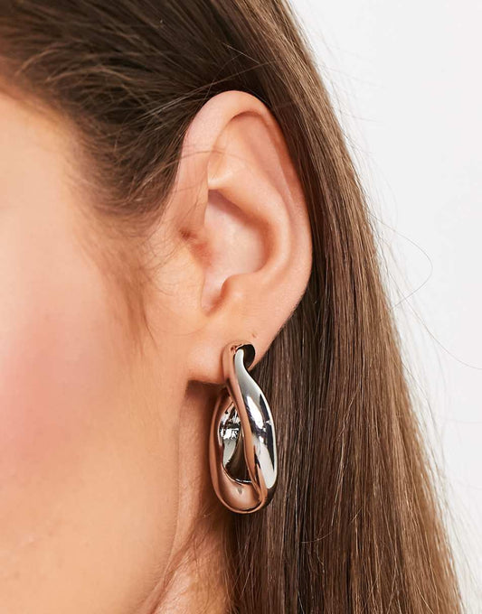 ASOS DESIGN hoop earring with twist link design in silver tone